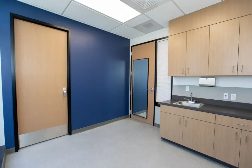 medical room blue walls modern cabinetry superior millworks baton rouge