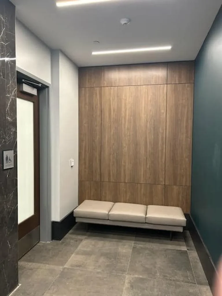 pace center lobby with wooden bench